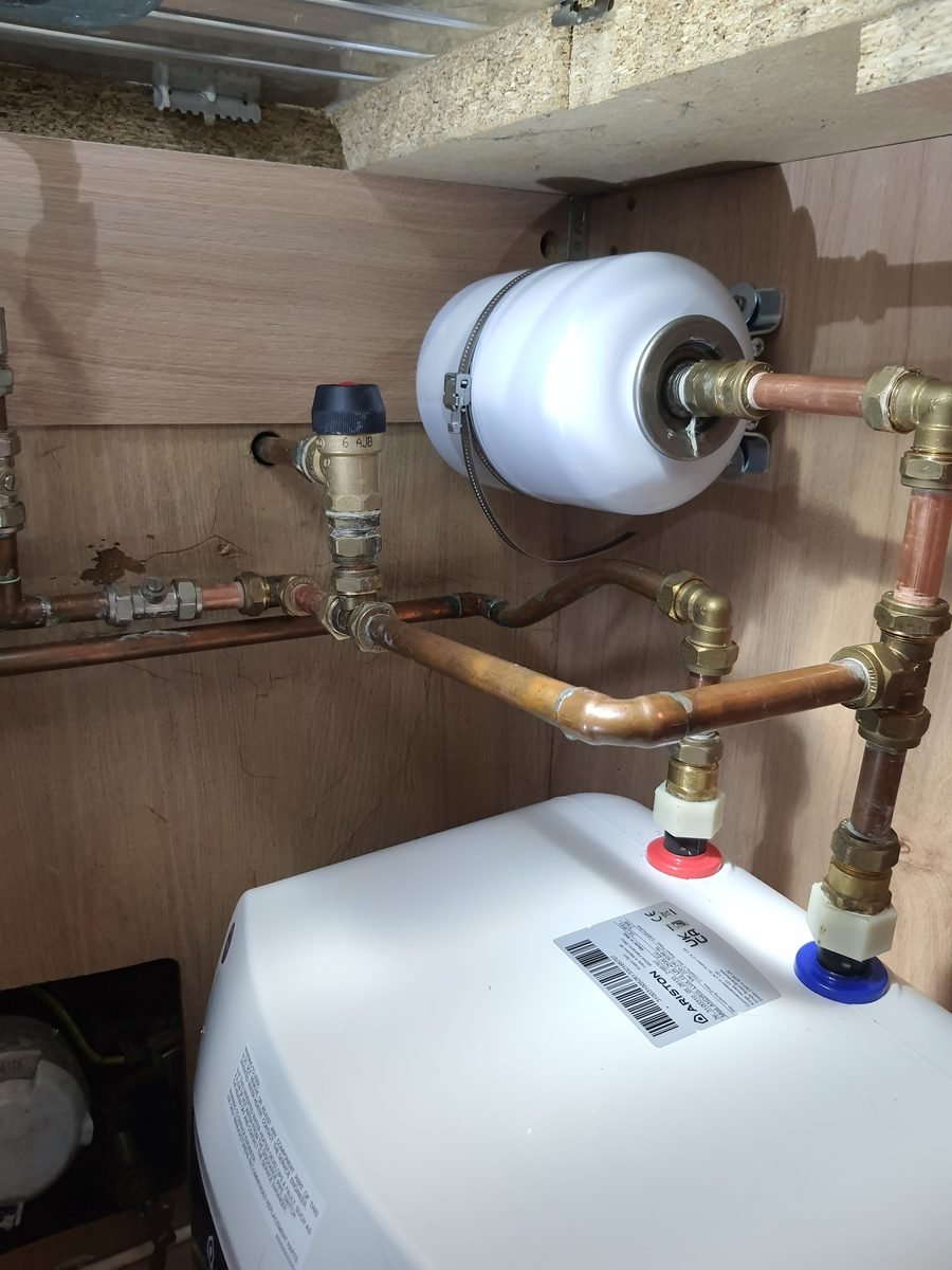 Unvented cylinder with expansion vessel and copper pipework